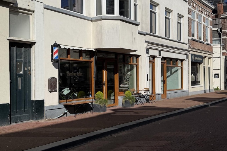 Bekijk foto Winkelruimte aan de Badhuisstraat 51 in Den Haag Bekijk foto Winkelruimte aan de Badhuisstraat 51 in Den Haag
