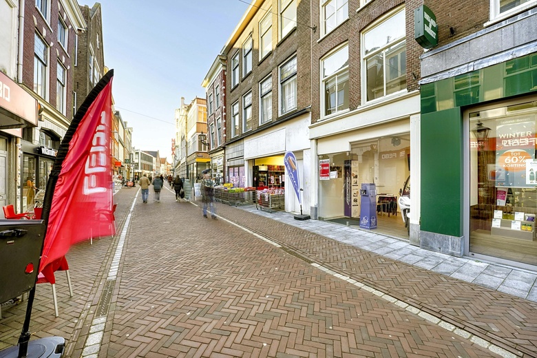 Bekijk foto Winkelruimte aan de Haarlemmerstraat 148 in Leiden